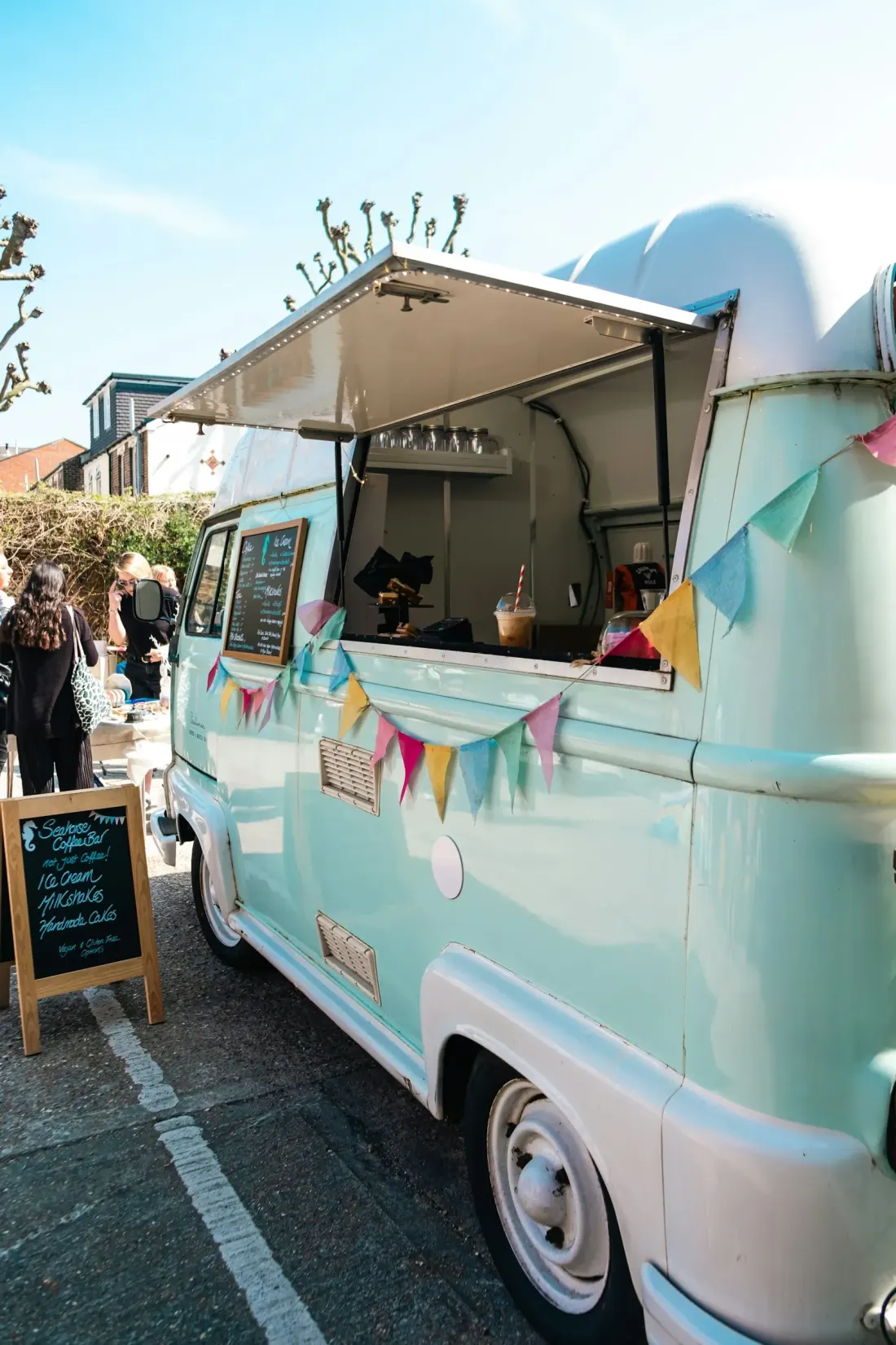 A food truck parked in a lot